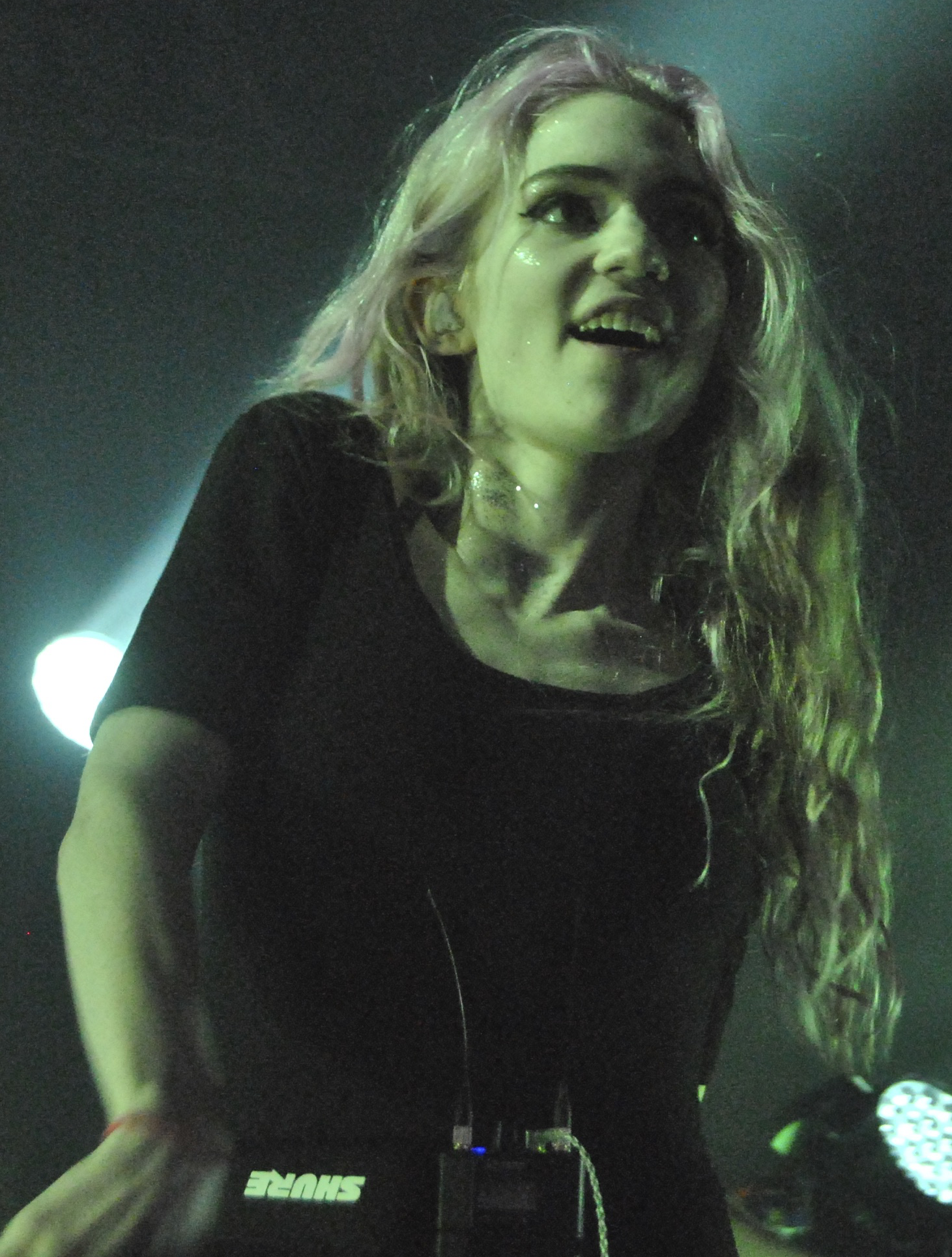 Imagem de referência relacionada a Grimes, item descrito como musicista canadiana